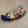 43538711-b708-46a0-82e2-21e3a6cf91a3-2 Tassel Pom Brooch